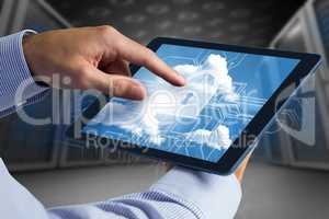 Composite image of man using tablet pc