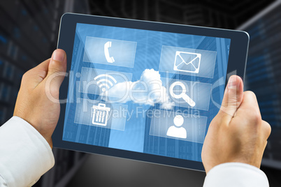 Composite image of man using tablet pc