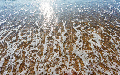 Soft wave of the sea on the sandy beach