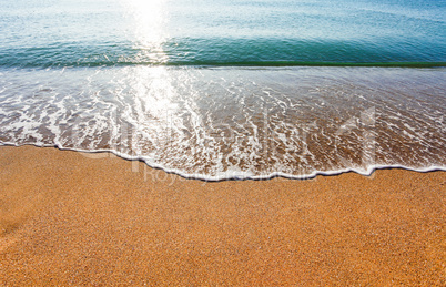 Soft wave of the sea on the sandy beach