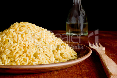 Risotto with Saffron on wooden table