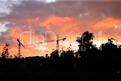 Crane Tower on Sunset Sky Background