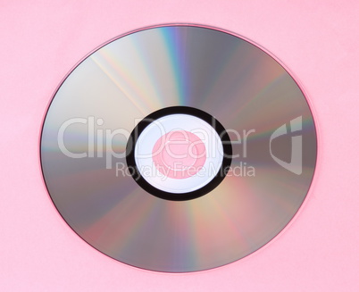 compact disc on pink background