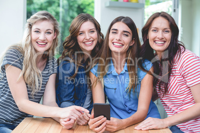 Beautiful women holding a mobile phone