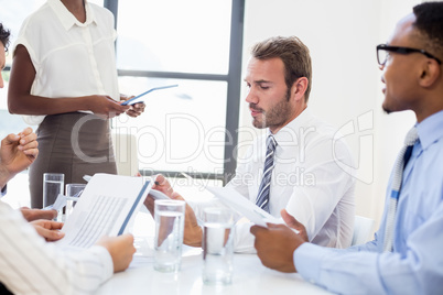 Business colleagues discussing in meeting