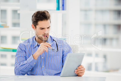 Businessman using digital tablet