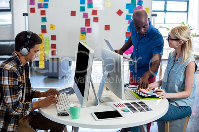 Graphic designers working at their desk