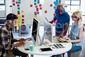 Graphic designers working at their desk