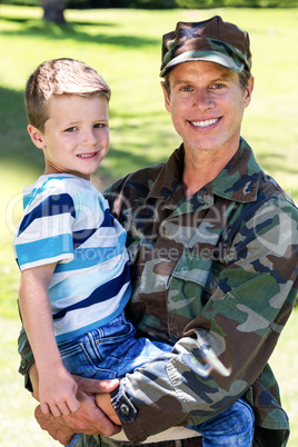 Happy soldier reunited with his son