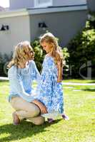 Smiling mother with daughter