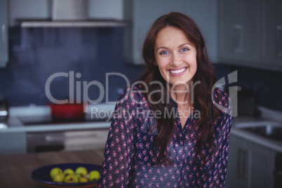 Beautiful woman smiling in kitchen