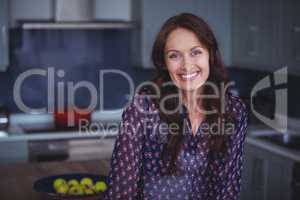 Beautiful woman smiling in kitchen