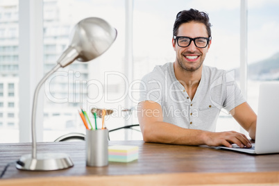 Young man working at his desk