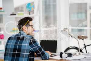 Young man working at his desk