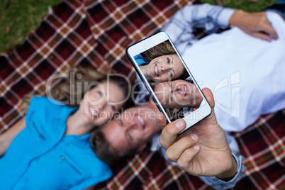 Couple taking a selfie from mobile phone