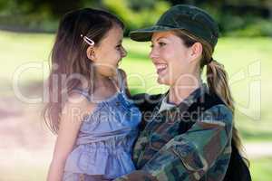 Happy soldier reunited with her daughter