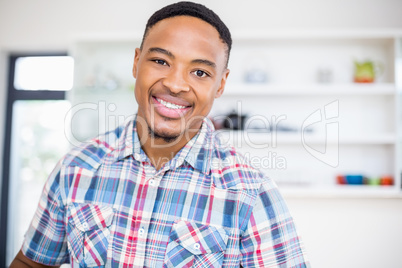 Portrait of young man smiling at camera