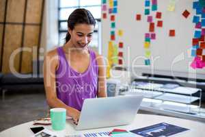 Young woman using laptop