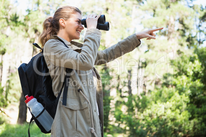 Woman using binoculars