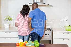 Young couple cooking food