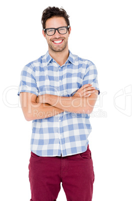 Handsome man is spectacles standing with arms crossed