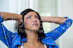 Tensed woman with hand on head