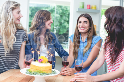 Happy friends celebrating a birthday together