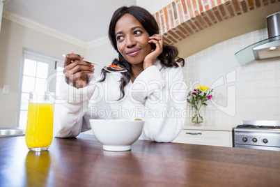 Young woman having breakfast