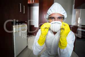 Portrait of confident pesticide worker wearing mask