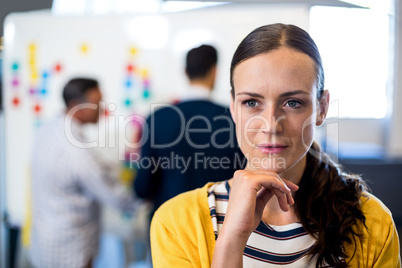 Thoughtful Young woman with hand on chin