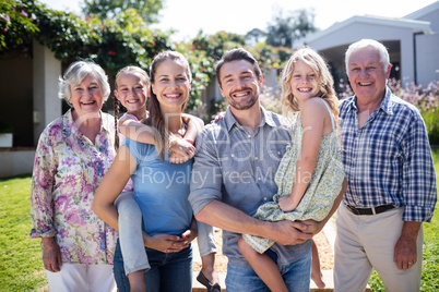 Portrait of a multi-generation family in the garden