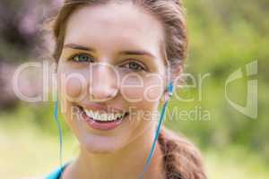 Smiling woman wearing earphones