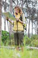 Woman with map and compass