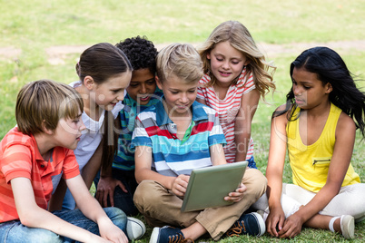 Children using digital tablet