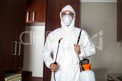Portrait of pest worker in protective suit