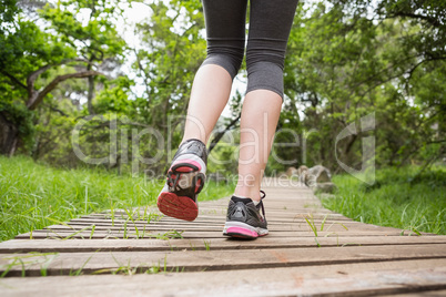 Close-up of woman jogging