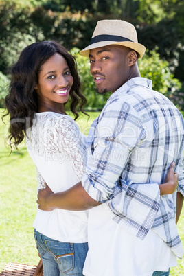 Young couple with picnic basket