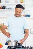 Man preparing a meal in kitchen