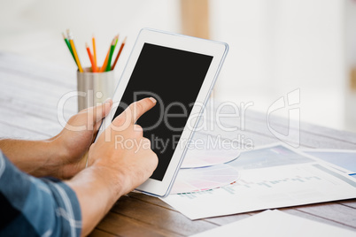 Man using digital at his desk