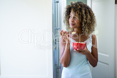 Young woman having breakfast