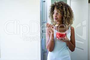 Young woman having breakfast