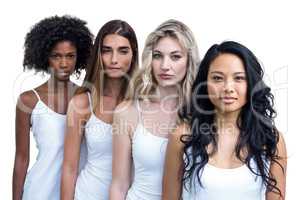 Multiethnic women standing in a line together