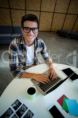 Young man working at his desk