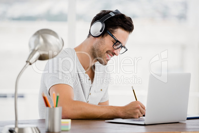 Young man working at his desk