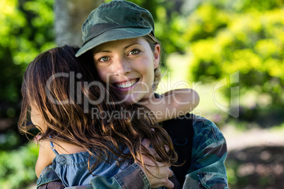 Happy soldier reunited with her daughter