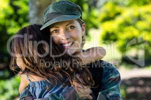 Happy soldier reunited with her daughter