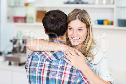 Young couple cuddling