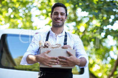 Portrait of happy delivery person