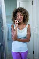 Happy woman talking on the phone