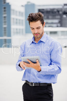 Businessman using digital tablet